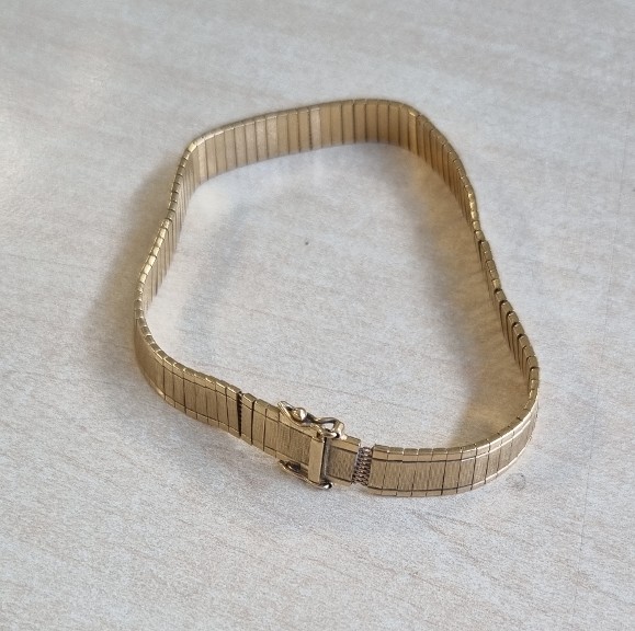 De gouden armband