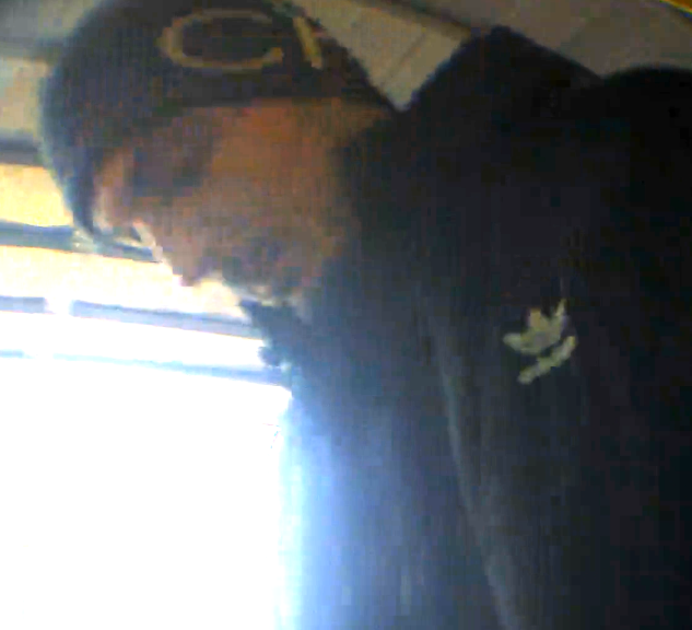 Afbeelding De verdachte bij de geldautomaat