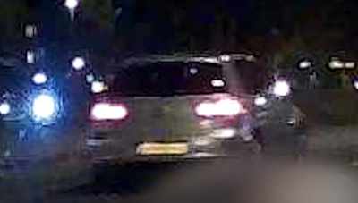 De grijze Volkswagen Golf