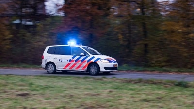 Politieauto met zwaailicht